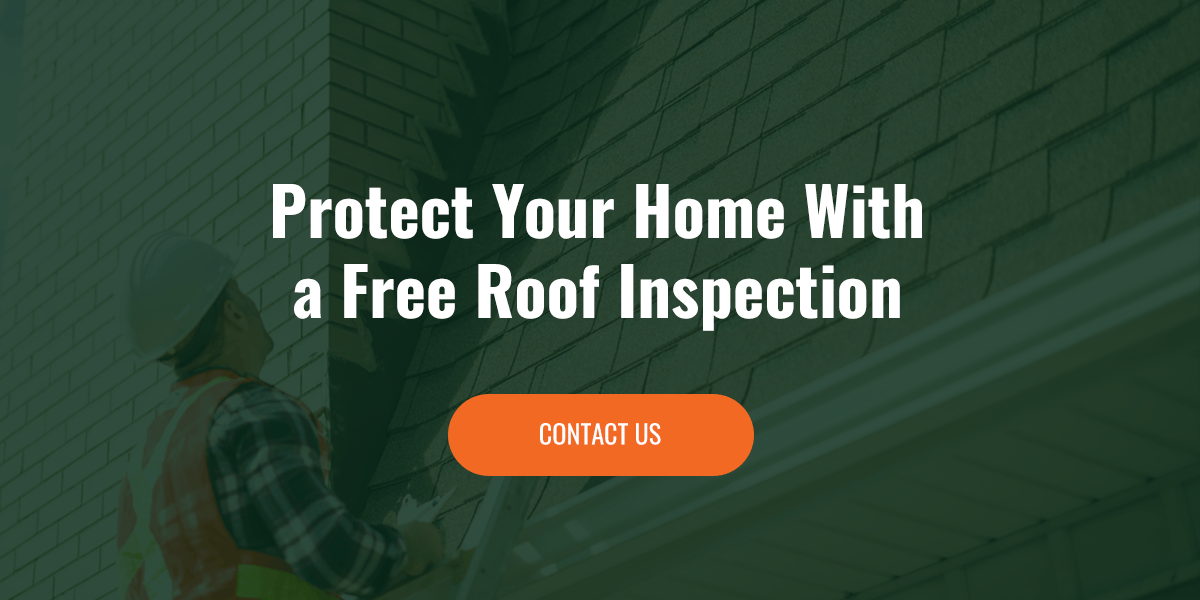 roofer inspecting a shingle roof