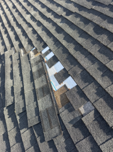 roof that needs shingles repaired